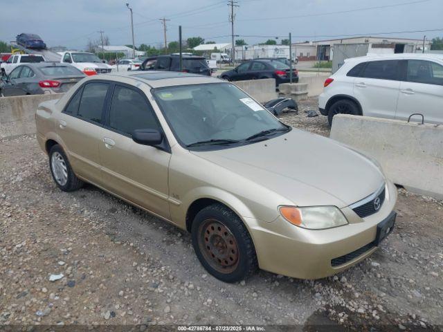  Salvage Mazda Protege